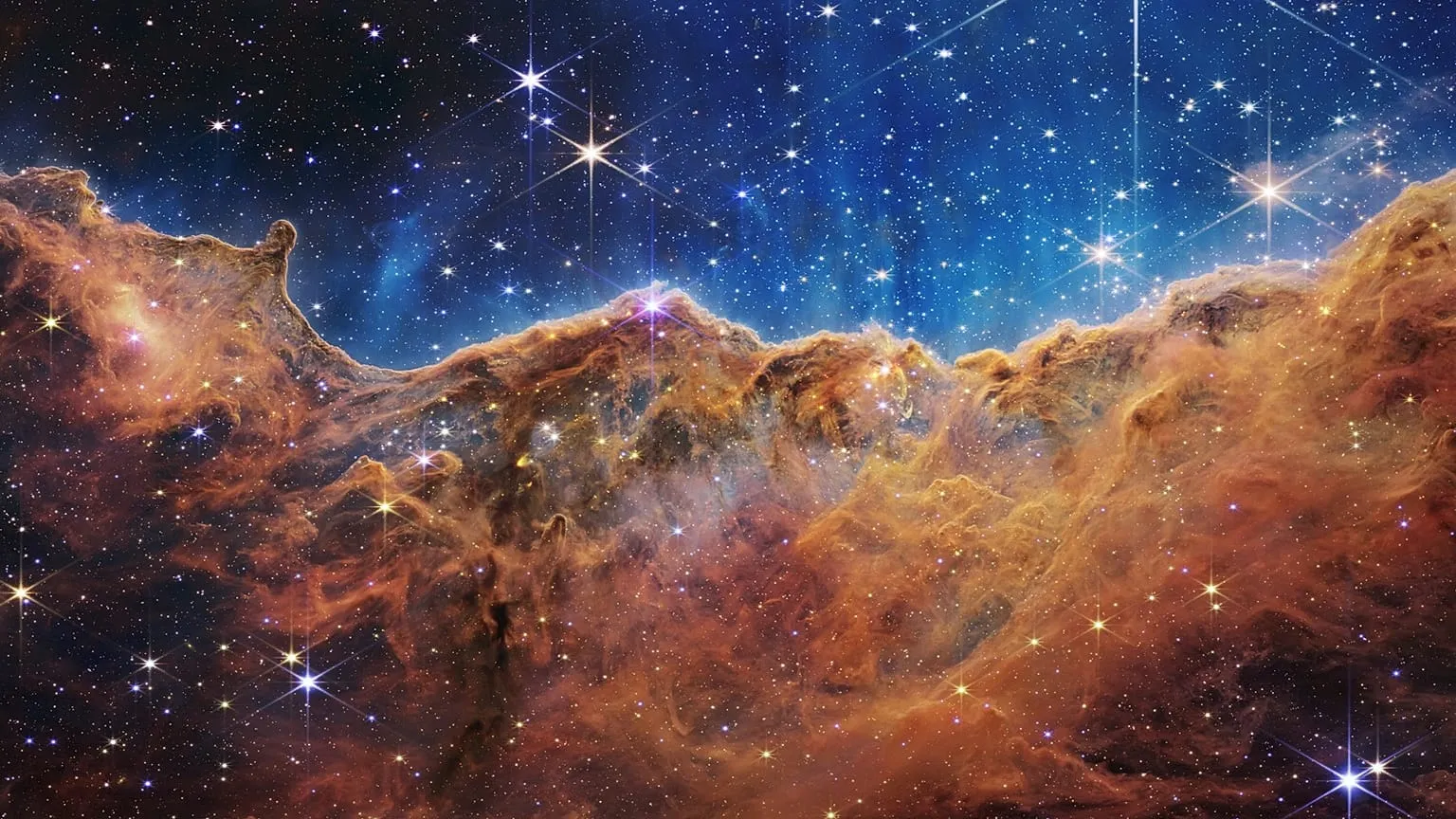 Il telescopio spaziale James Webb svela i magnifici dettagli e i colori straordinari di Pismis 24: un viaggio nell’interiorità di un giovane ammasso stellare