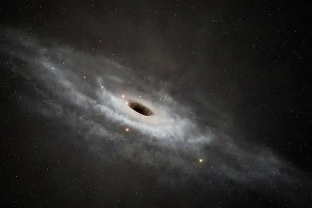 Abell 2744-QSO1, il buco nero che pesa piu' della sua galassia ospite